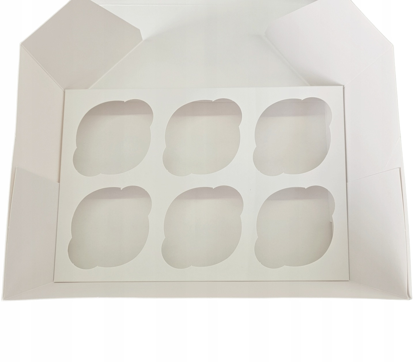 Składane pudełko na muffinki wygodne w przechowywaniu