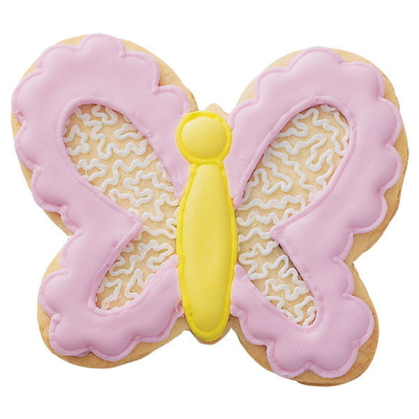 Foremka Wilton motyl i gotowe ciasteczko w kształcie motyla z lukrem