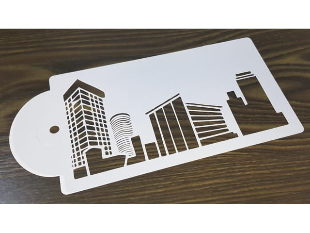 Zestaw szablonów MIASTA BUDOWLE na tle udekorowanych tortów